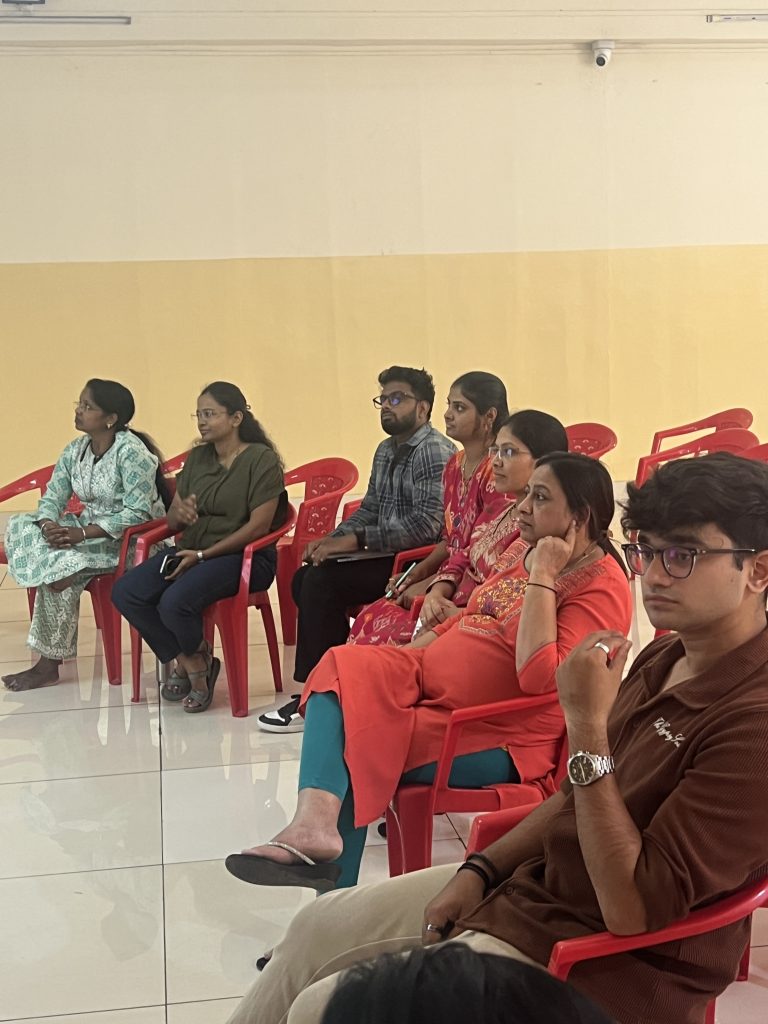 Participants and the FRST team gather for a computer training workshop at PBMA.