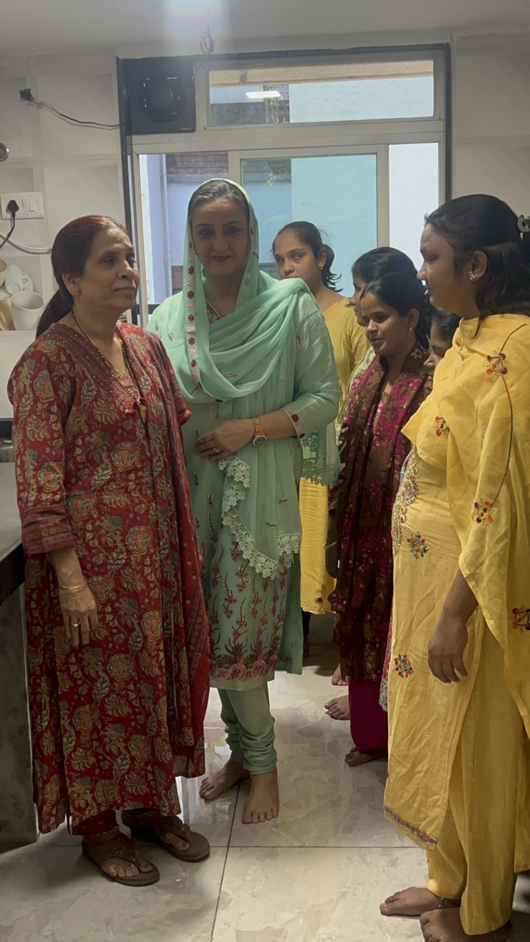 Participants and a FRST representative gather in the cooking-class kitchen at BPA.