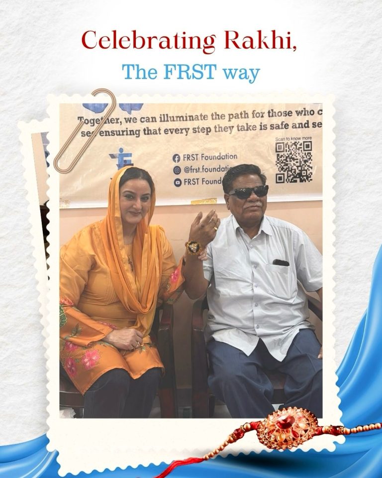 A published FRST Rakhi celebration photograph shows two participants seated together, with a rakhi raised for the camera.