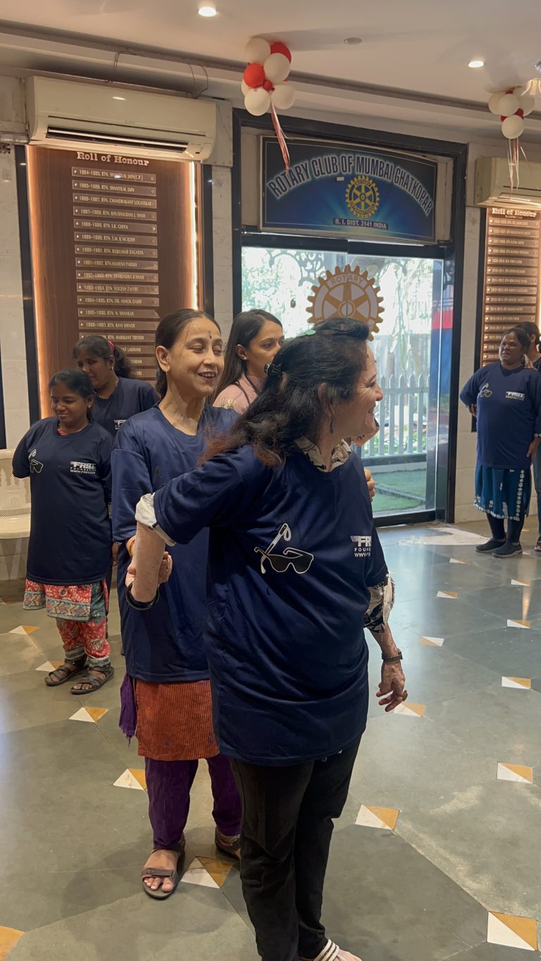 Two participants practise a self-defence movement together at BPA.