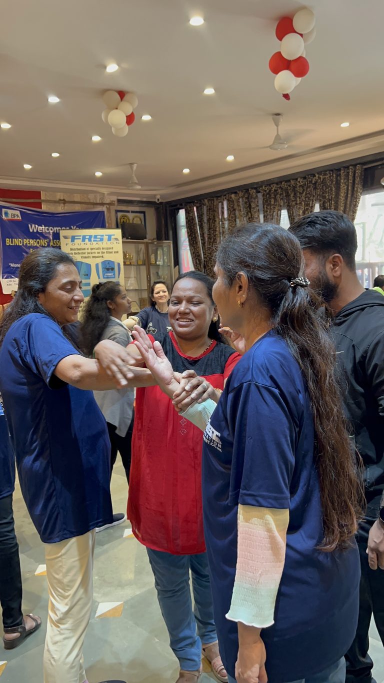 Participants practise a wrist-release movement together at BPA’s self-defence workshop.